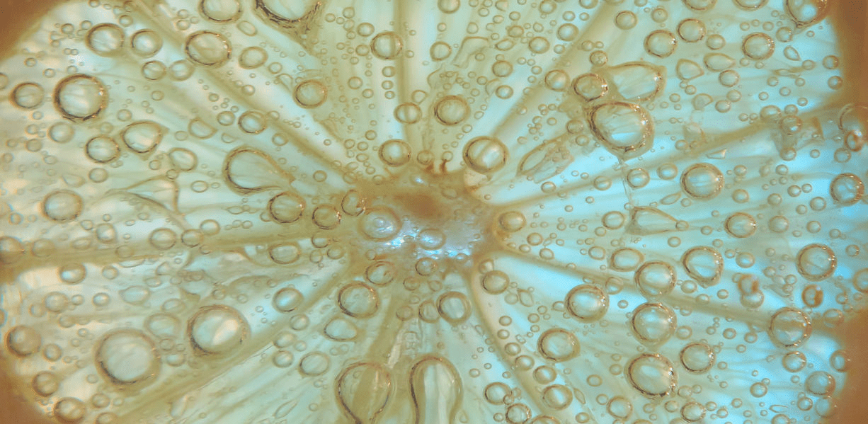 A close up of water droplets on the surface