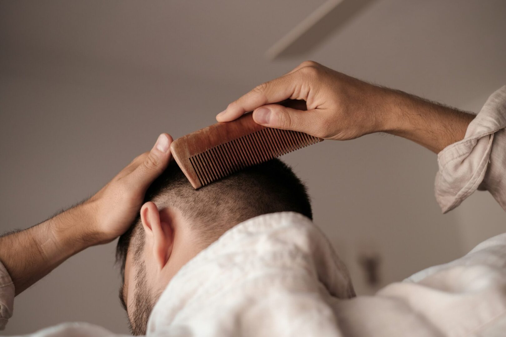 man-combing-hair